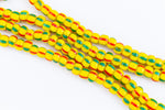 9/0 Opaque Yellow/Green/Red Stripe Czech Seed Bead (1/2 Kilo) Preciosa #83590