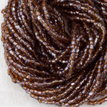9/0 Luster Transparent Dark Goldenrod 3-Cut Czech Seed Bead (10 Hanks) Preciosa #16120